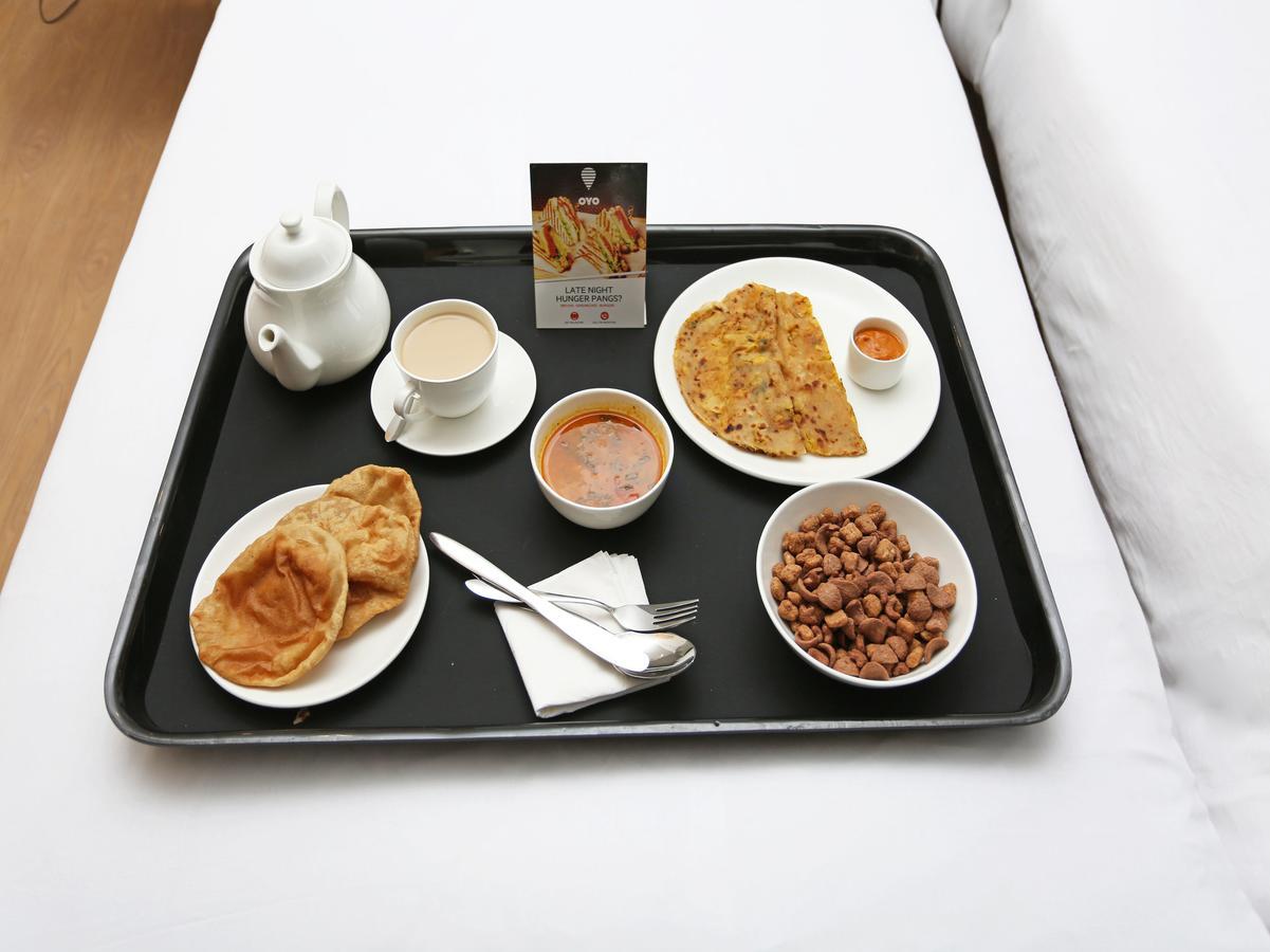Oyo 10425 Queens Pearl Inn เดห์ราดุน ภายนอก รูปภาพ